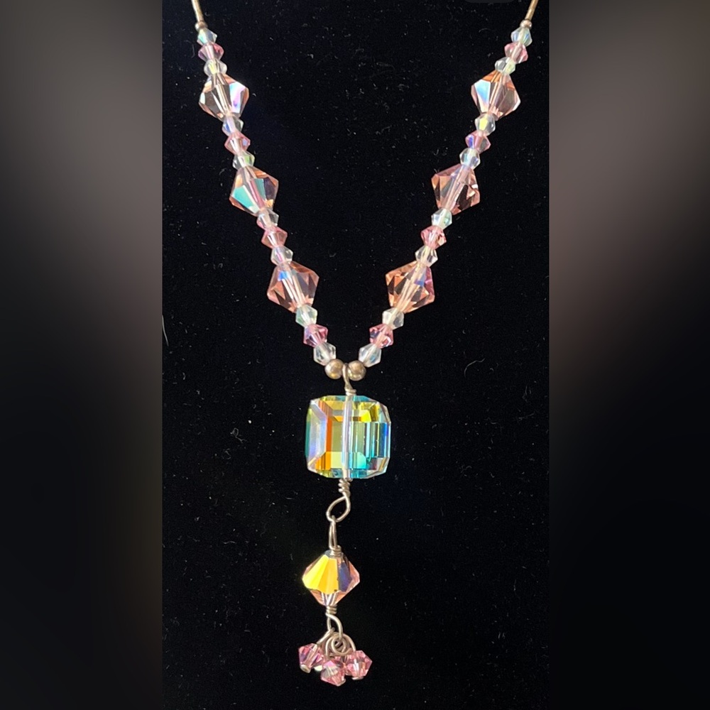 Swarovski beaded silver necklace with large pendant and matching earrings.